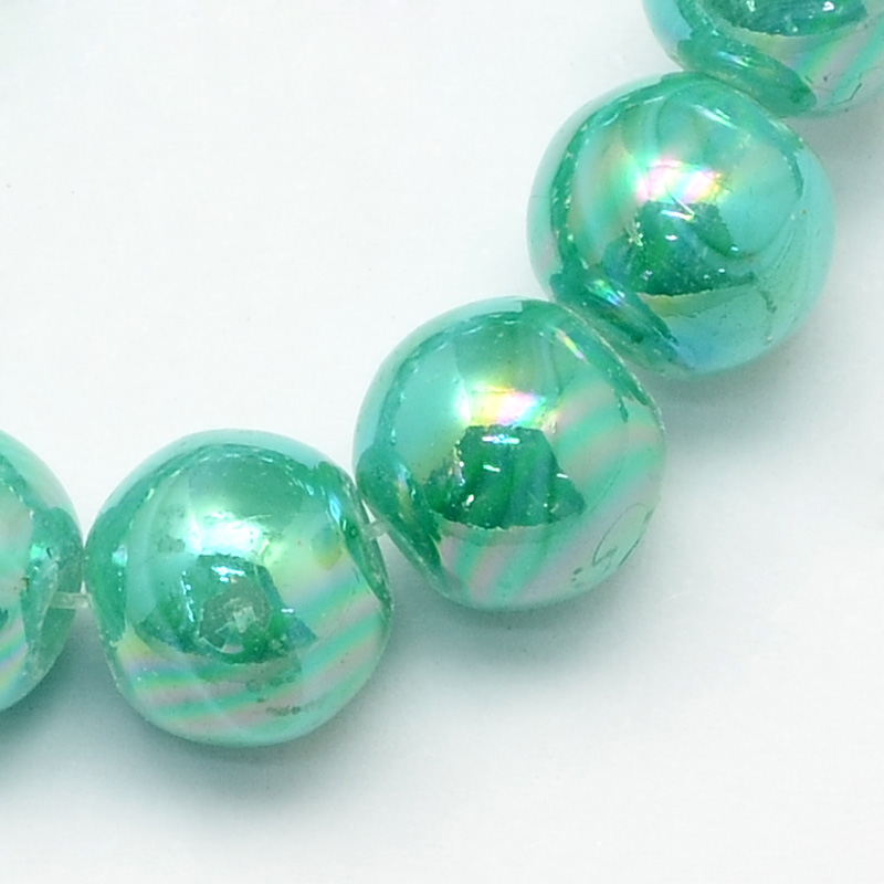 Voskované perly 50ks sklenené 4mm dúhové tm. zelené