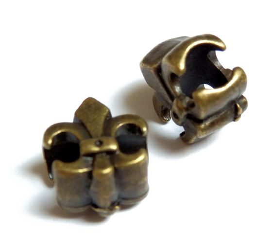 Kovové korálky 1ks 9x12mm starobronz