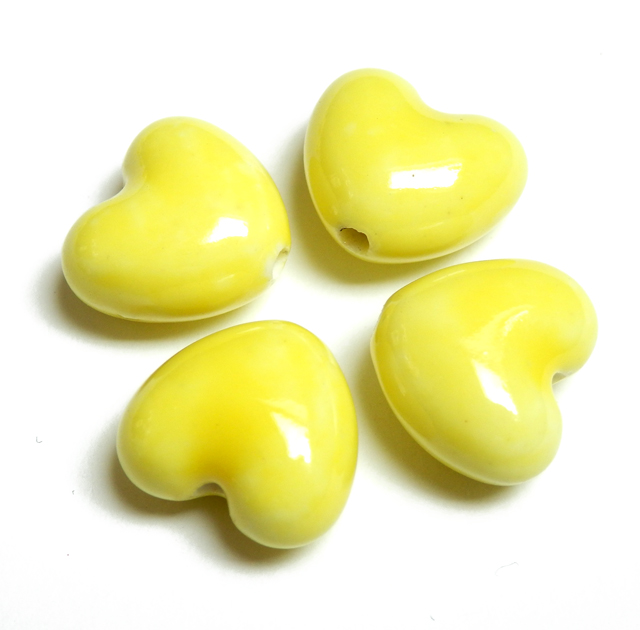 Ručne robené keramické korálky s perleťou srdce 12x14x8mm 1ks žltá