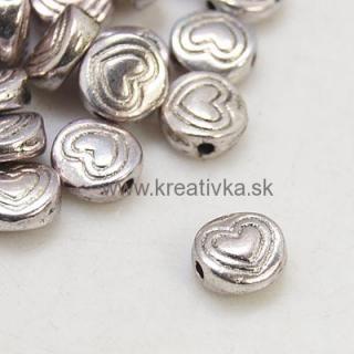 Kovová korálka 10ks 6,5x3mm platina